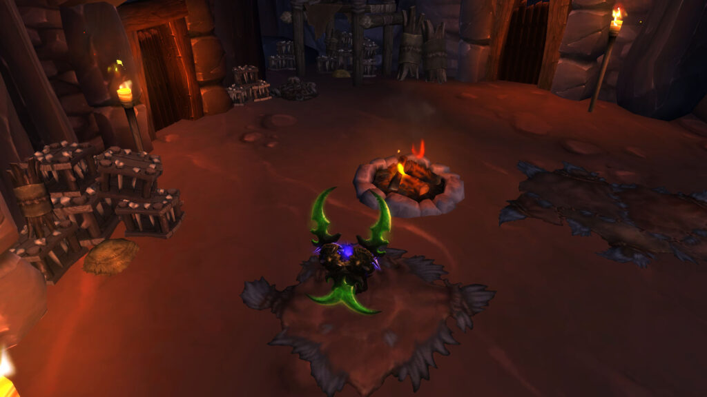 WoW the night elf is sitting by the campfire